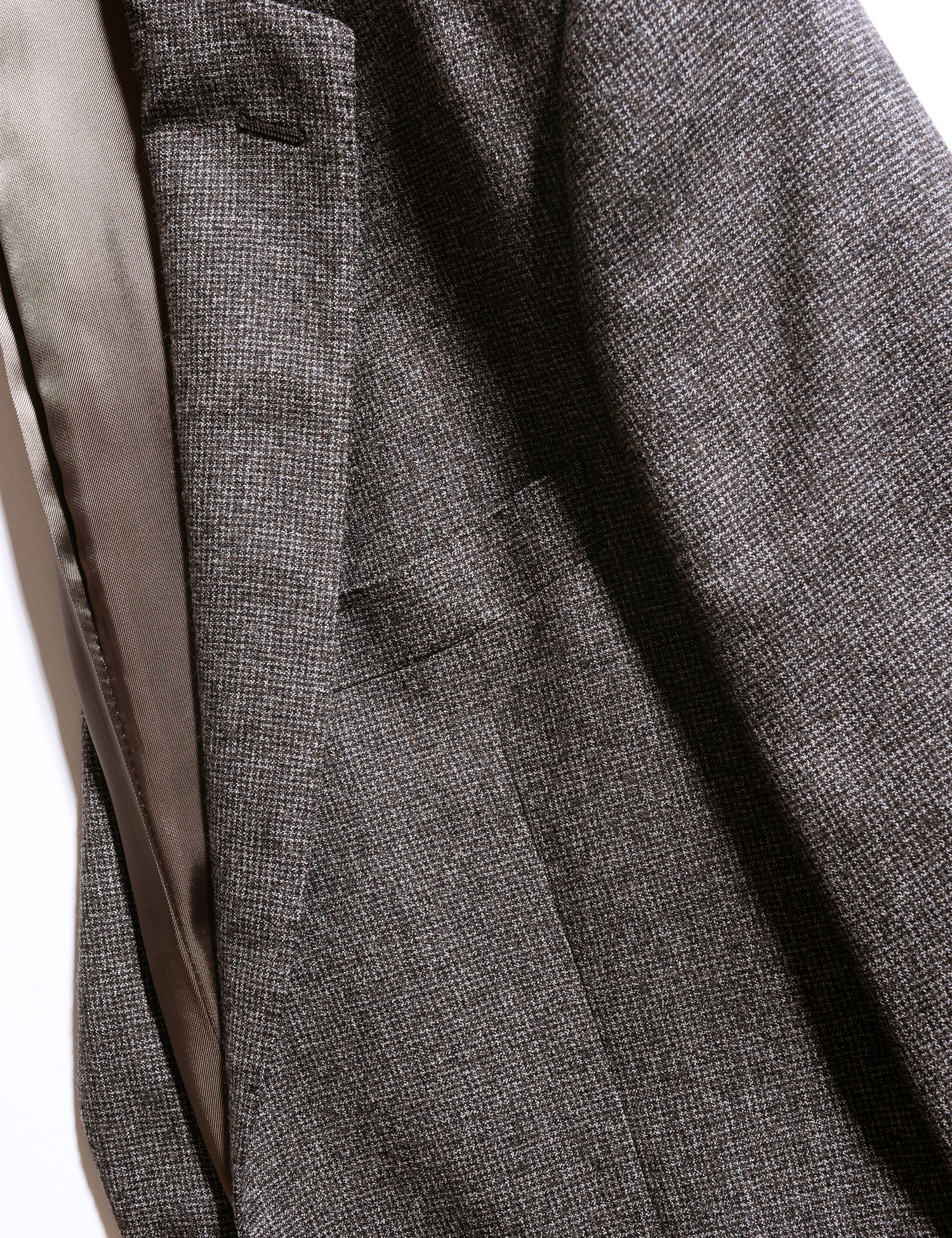 Detail shot of Brooklyn Tailors BKT50 Tailored Jacket in Super 130s Houndstooth Flannel - Smoke showing lapel and chest pocket