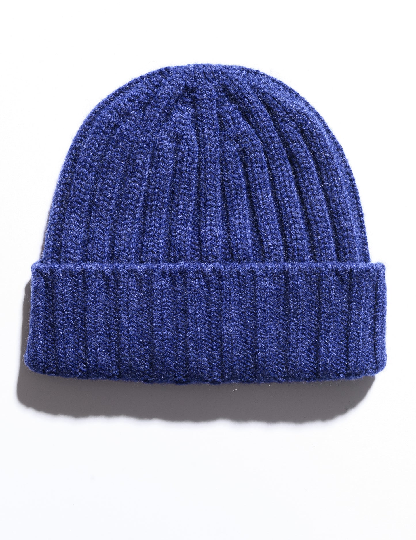 Flat shot of Cableami Cashmere Beanie - Heather Blue